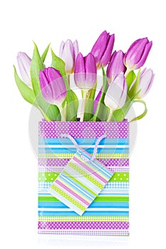 Purple tulip bouquet in gift bag