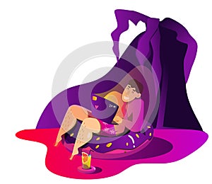 Purple twilights. Fat man is resting on an inflatable ring and confers online. Freelance and distance work concept