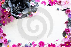 purple, violet, magenta, pink flower spiral rustic composition