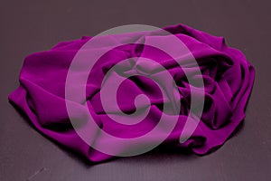 Purple, violet tender colored textile, elegance rippled material