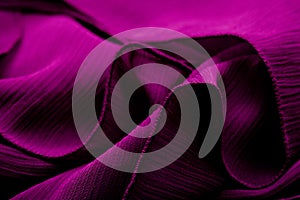 Purple, violet tender colored textile, elegance rippled material