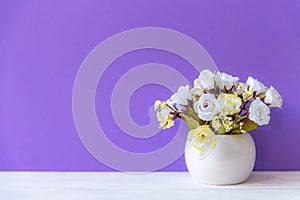 Purple wall with calla lily rose white flower on shelf white wood, copy space for text.