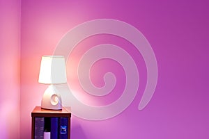 Purple wall and lamp