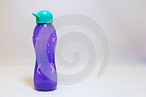 Purple Water Bottle with Teal Green Lid