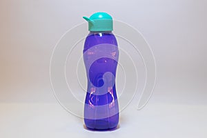 Purple Water Bottle with Teal Green Lid