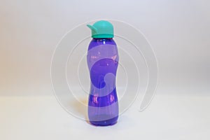 Purple Water Bottle with Teal Green Lid