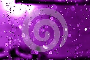 Purple water droplets background