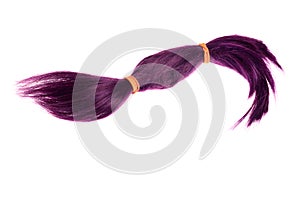 Purple weft of hair isolated