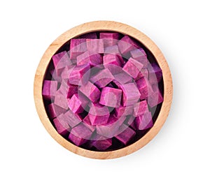 Purple yams slice in wood bowl on isolated white background