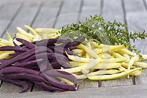 Purple and yellow beans with herbs