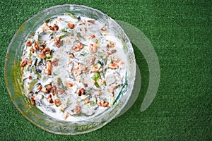 Purslane salad with yogurt. with walnut decoration