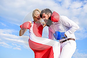 Pursue course of self defence. Attack is best defence. Defend your opinion in confrontation. Man and woman fight boxing