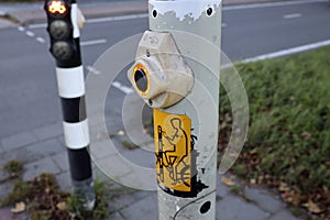 Push button and bike stop light on a road in Nieuwerkerk aan den IJssel