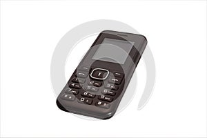 Push-button mobile phone black color isolate on a white background close-up.