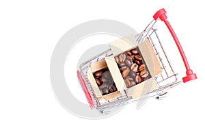 Push cart with shipping boxes full of coffee beans