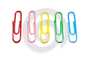Push pins and paper clips in different colors isolated on white background.