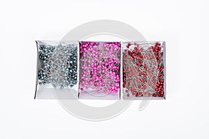 Push pins on white background