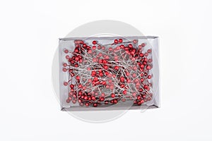 Push pins on white background