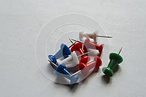 Push Pins On White Paper