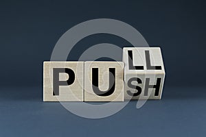 Push or Pull. The cubes form the choice words Push or Pull
