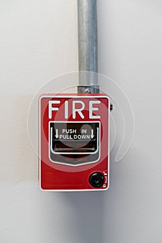 Push in pull down switch fire on white wall