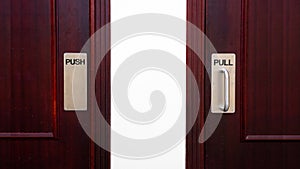 Push and pull sign on a door at a apartment