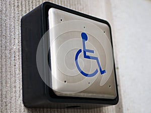 Push to open button for disabled