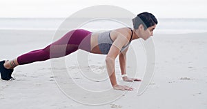 Push up, fitness and woman on the beach with exercise, health and wellness in nature. Strong, workout and person