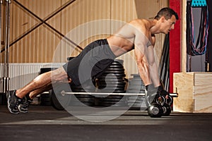 Push up on kettlebells