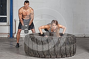 Push up on a tire fitness training