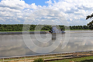 Pusher Tug and Liquid Carrying Barge on the Illinois River