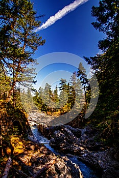 Pushing through boulders - Englishman river falls, Vancouver Island, BC