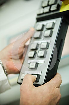 Pushing the button on the control panel