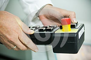 Pushing the button on the control panel