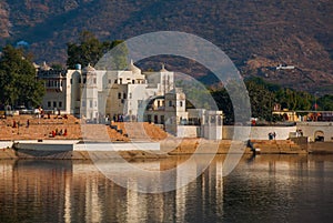 Pushkar. India.Houses reflected in the water. A beautiful lake.