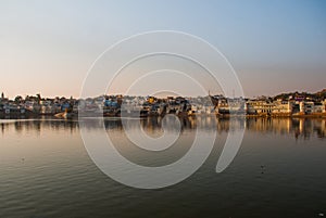 Pushkar. India. Houses reflected in the water. A beautiful lake.