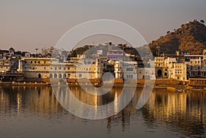 Pushkar. India. Houses reflected in the water. A beautiful lake.