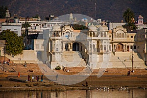 Pushkar. India.Houses reflected in the water. A beautiful lake.