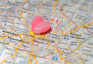 Pushpin over Madrid map