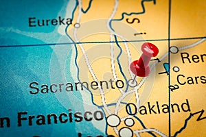 Pushpin pointing at Sacramento city in California, America