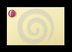 Pushpin on a yellow note