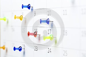 Pushpins on calendar