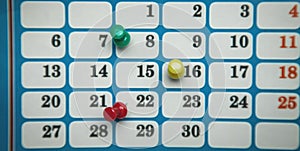 Pushpins on calendar. Concept of important day