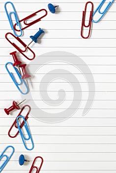 Pushpins and Paperclips on Notepaper