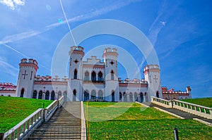 Puslowski palace castle building in Kosava Kossovo with staircase and green lawn in sunny summer day