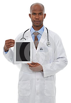 Put your copy space on this blank screen. Studio shot of a young doctor holding a digital tablet isolated on white.