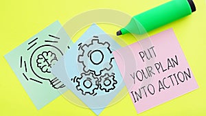 Put your plan into action is shown using the text and pictures of gears and lamp