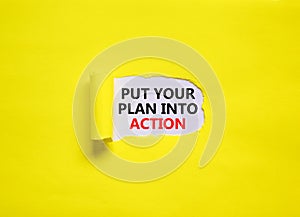 Put your plan into action symbol. Concept words Put your plan into action on beautiful yellow background. Business planning and