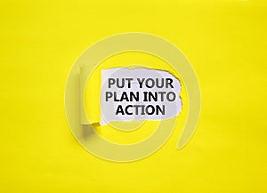Put your plan into action symbol. Concept words Put your plan into action on beautiful yellow background. Business planning and