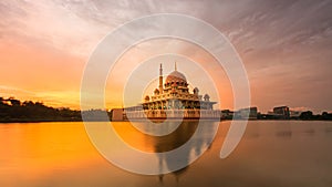 Putra mosque during sunset sky, the most famous tourist attraction in Malaysia.